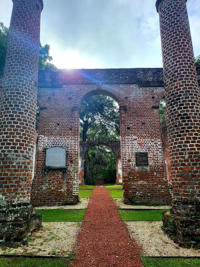 Sunlight through the brick archway of Old Sheldon Church